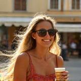 Marta Rossi in Milan enjoying coffee outdoors